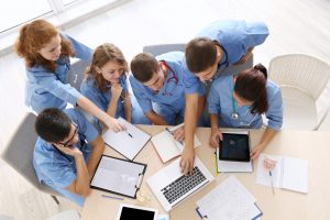 Medical students studying at university indoors